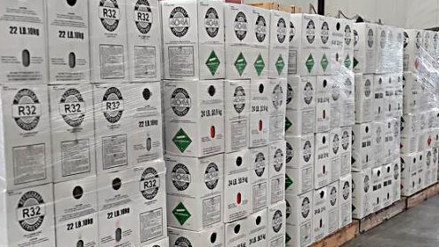 Pallets of boxes marked R32