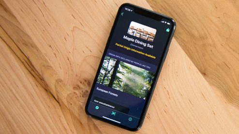 The origin app on a smartphone screen notes that partial origin information is available for a maple dining set