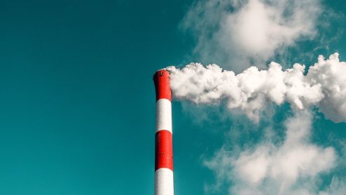 Smoke spews from a chimney