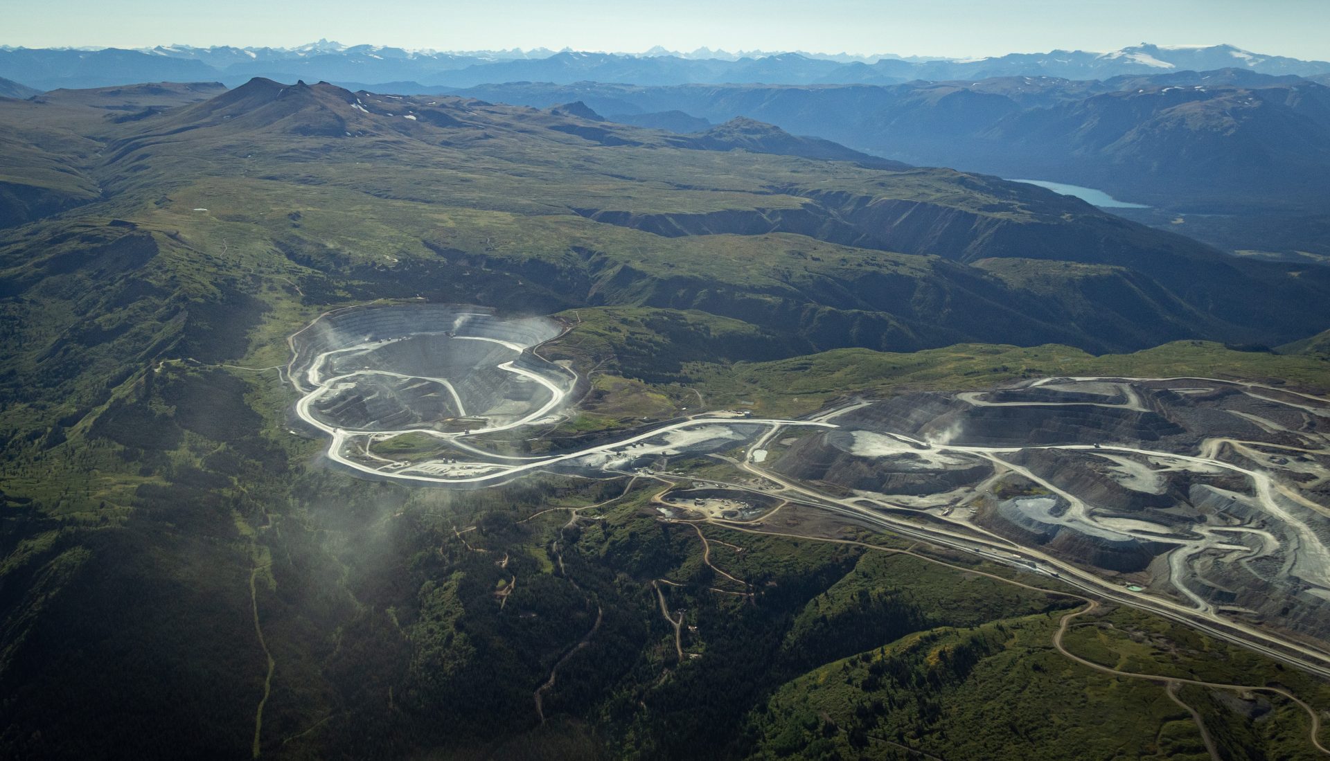 Roads and mining pits scar an otherwise stunning mountain landscape