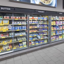 A row of refrigerators at a supermarket