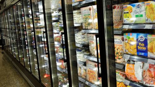 Supermarket refrigerators full of frozen food