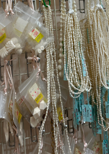 Ivory beads and other materials on display