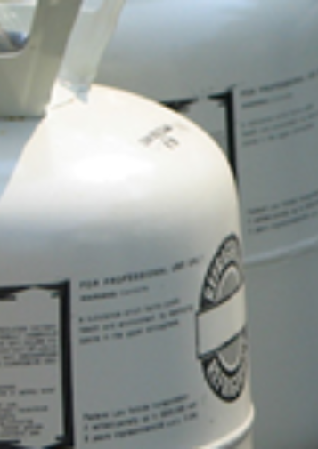 Closeup of a row of refrigerant containers