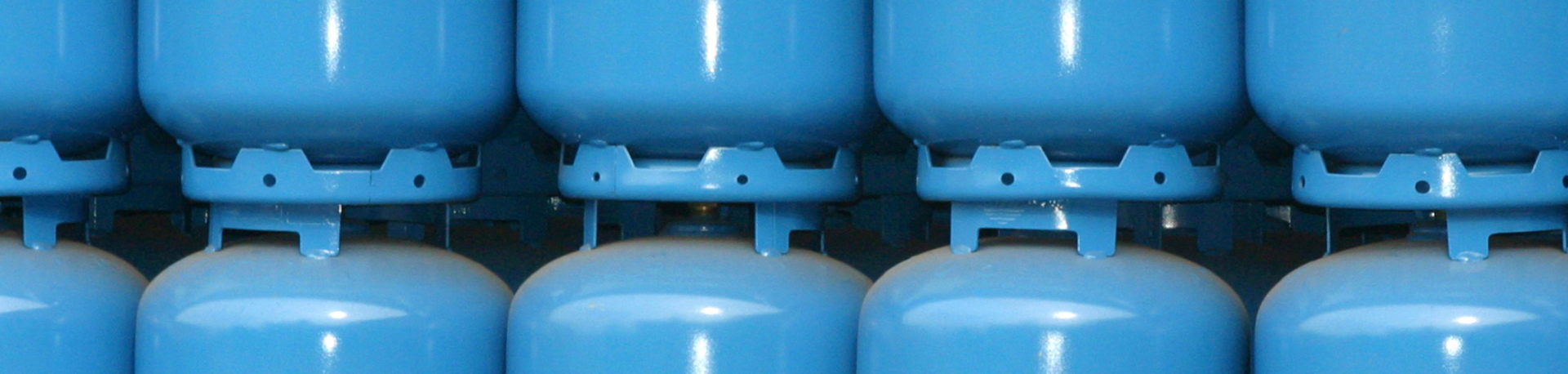 Row of blue refrigerant containers