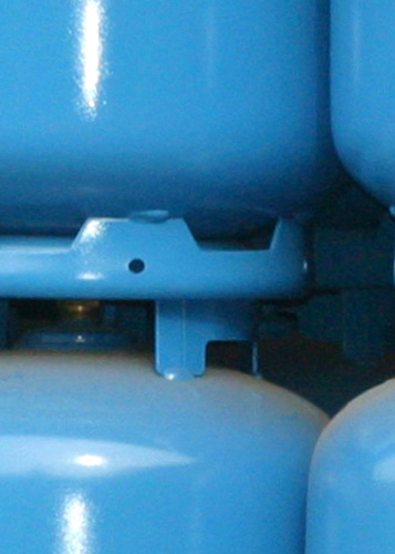 Row of blue refrigerant containers